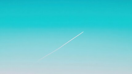 Contrail in Clear Sky over Soft Gradient of Vibrant Blue and Light Teal at Dusk