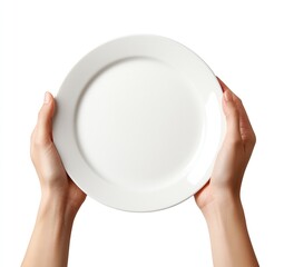 Woman's hands gently hold a pristine white dinner plate against a stark white background. Simple elegance.