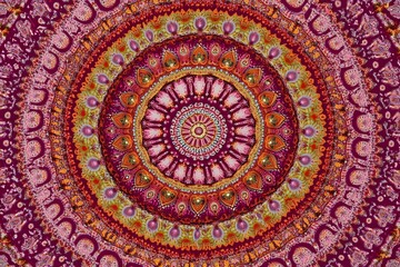 Vibrant intricate circular textile design with captivating symmetry