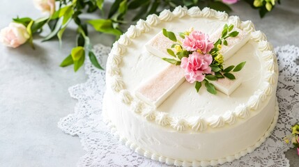 Elegant White Cake with Floral Cross - A delicious-looking white cake adorned with a delicate floral cross and pink flowers, perfect for celebrations