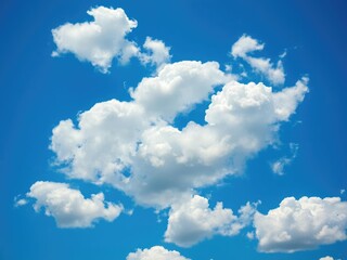 Vivid and vibrant blue sky with fluffy clouds formation, sky, sunny