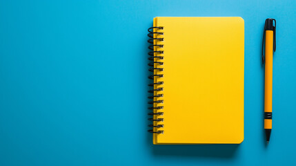 The yellow-colored diary is showcased up close on a blue isolated background.
