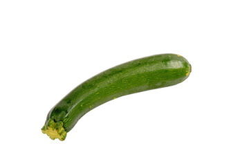 A green zucchini is shown on a white background. It is long and slender. The zucchini is fresh and ready to be eaten
