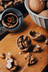 Cracked walnuts on cutting board