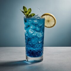 A close-up shot of a Blue Lagoon mocktail in a highball glass, with a gradient of blue hues, garnished with a sprig of mint and a twist of lemon peel, placed on a white surface.