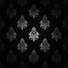 Decorative silver patterns on black striped background.