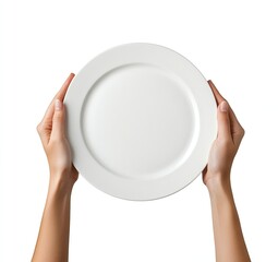 A pair of hands delicately holds a pristine white dinner plate against a stark white backdrop. The image is clean and minimalist.