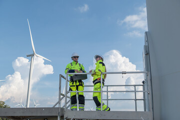 Wind Turbine Maintenance and Repair Technician, Engineer Checking Turbines working maintenance...