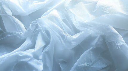 Obraz premium Textured, multi-layered light blue fabric in close-up; the larger top layer adds depth and dimension, creating an intriguing tactile feel