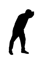 silhouette of  side view of a man with his hand on his forehead looking into the distance
