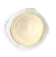Tasty mayonnaise sauce in bowl isolated on white, top view