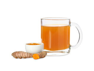 Aromatic turmeric tea in glass cup, roots and powder isolated on white