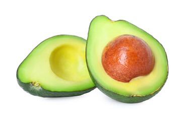 Halves of ripe avocado isolated on white