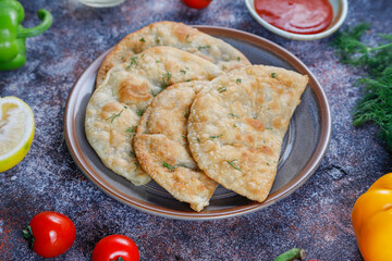 Traditional Russian deep fried meat pies - chebureki.