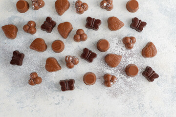 Handmade chocolate with pistachios, dark and milk chocolate pieces.