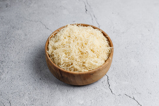 Homemade uncooked kataifi or kadaifi dough.