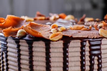 Snickers cake with caramel, peanuts and buttercream.