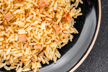 Rice with ham meat main course delicious fresh delicious gourmet food background on the table rustic food top view copy space