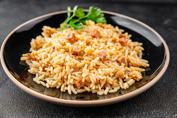 Rice with ham meat main course delicious fresh delicious gourmet food background on the table rustic food top view copy space