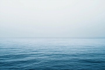 Fototapeta premium Landscape view of beach with clear sea water, Scenery view of ocean and beach, Summer vacation destination, Horizontal line ocean with color matching.