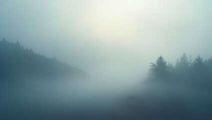 Fototapeta premium Misty evergreens create a hazy blue landscape, evoking a feeling of serene tranquility.