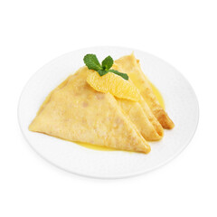 Plate with tasty crepes Suzette isolated on white