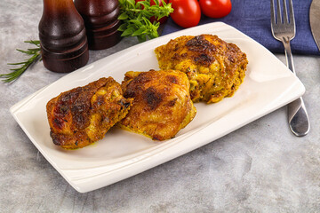 Roasted chicken thighs  with spices
