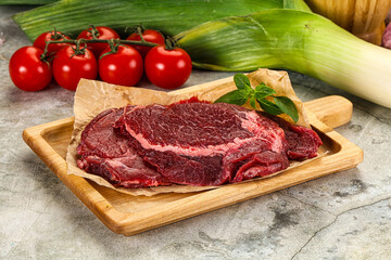 Raw beef cheeks cut for cooking