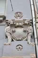 sculpture on the facade of an old building