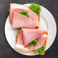 Sandwich ham tasty fresh delicious gourmet food background on table rustic food top view copy space