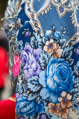 Russian folk pattern on a scarf and flowers