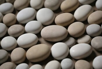 Minimalistic background/backdrop. White round stones / pebbles.