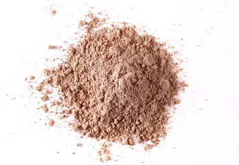 Pile chocolate pudding powder isolated on white, top view