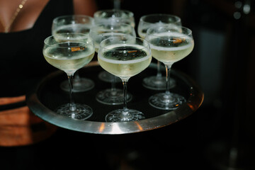 Elegant cocktails served at a social gathering in an upscale setting during the evening