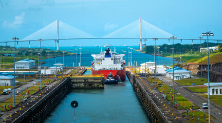Opening of a massive lock behind a container ship at the new Agua Clara locks on the Atlantic/Caribbean side, Colón, Panama. The Atlantic Birdge can be seen in the background. © Luis