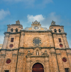 Fototapeta premium The imposing stone and coral facade of the ISan Pedro Claver (XVII c. AD), Cartagena de Indias, Colombia