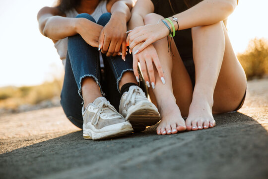 two girls sitting together