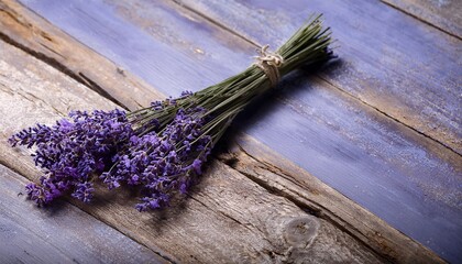 sprigs of lavender on wooden shabby background