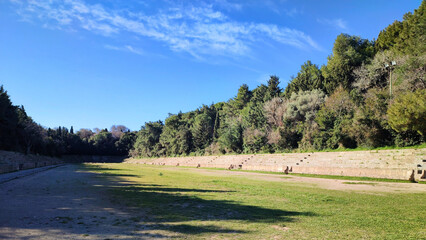Photo of the ancient Olympic sadium on Monte Smith Hill in Rhodes, Greece. Once hosting the Haleion Games for Helios, it was restored by the Italians during their early 1900s occupation of the island.