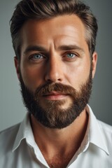 Obraz premium arafed man with a beard and a white shirt looking at the camera