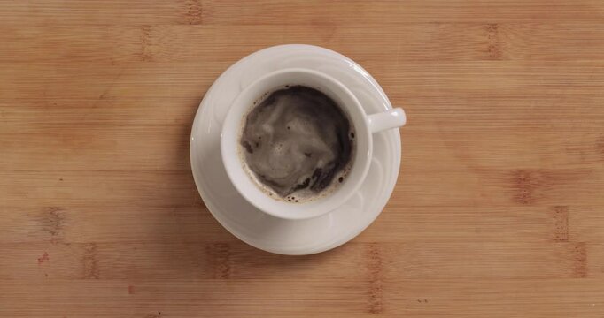 A cup of coffee on a table