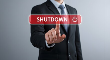 Businessman pressing shutdown button shown on futuristic virtual digital screen
