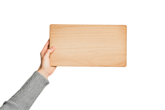 A hand holding a wooden stick sign with a white blank paper for your message or text