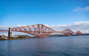 Landscape photography of railway Forth bridge, coastline with old historic village North...