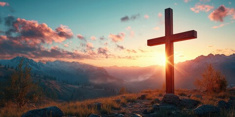 Sunset behind a wooden cross on a mountain overlook with colorful clouds and distant peaks