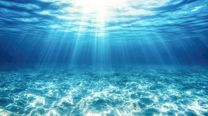 Sunlight rays penetrating clear ocean water creating stunning underwater scene