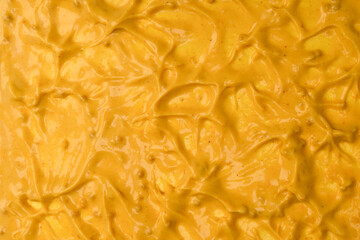 Yellow sauce splashes as a background.