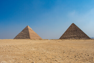 View of The Giza Necropolis, Famed archaeological site featuring the Great Pyramids, the Great Sphinx and The Great Pyramid of Giza in the desert of Giza, Cairo, Egypt.