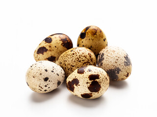 Obraz premium Quail eggs on a white background, small with a characteristic spotted shell. Minimalist style, natural product, healthy protein food.