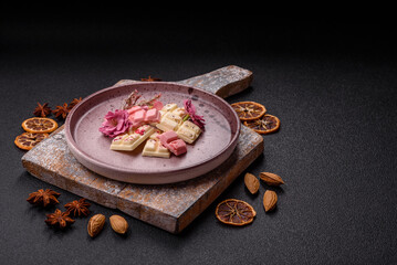 Multicolored handmade chocolate bars pink, white, brown colors